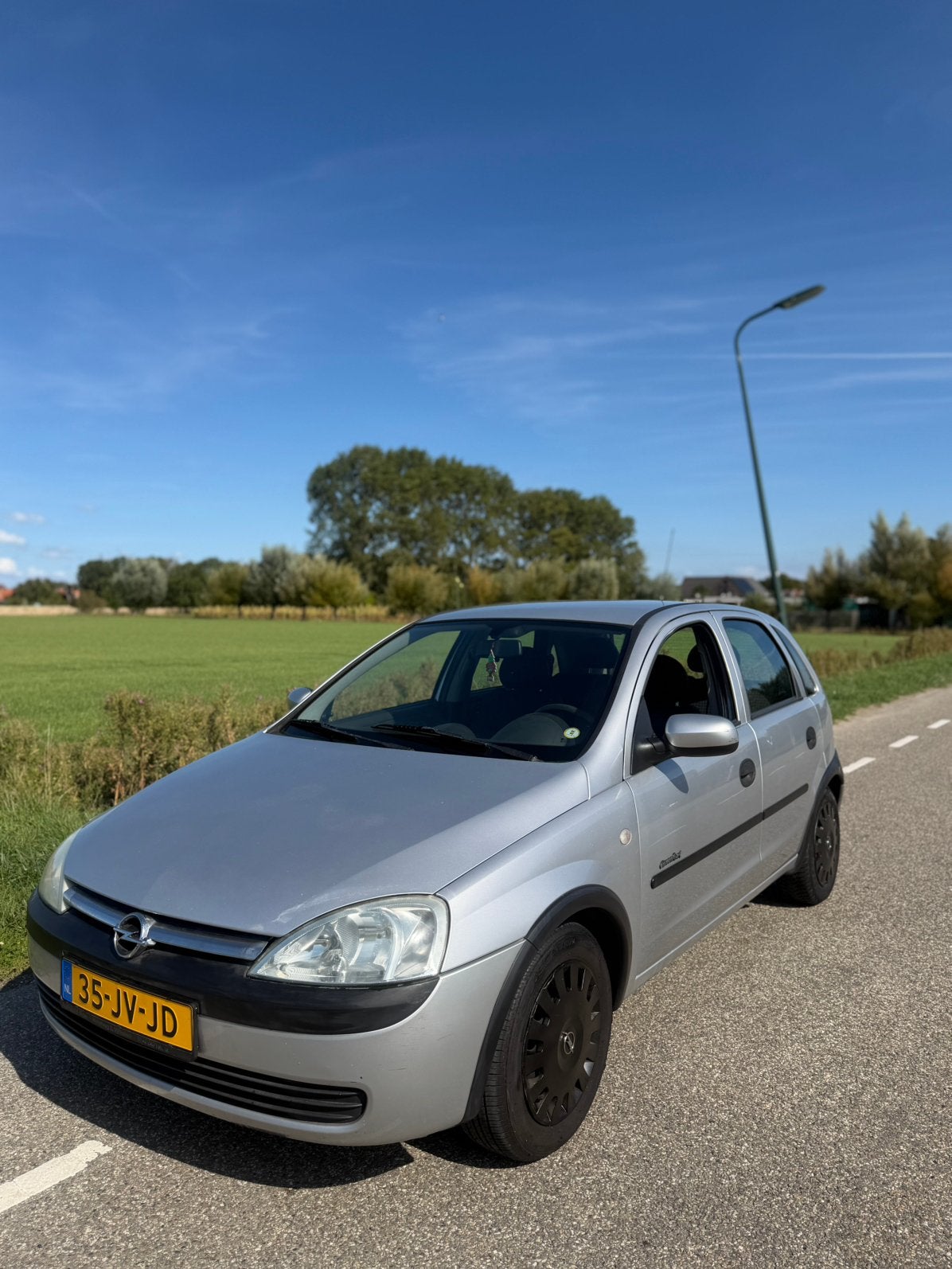 Opel Corsa 1.2 16V 5D LAGE KM !, Voorwielaandrijving, 450 kg, 74 pk, 31 €/maand