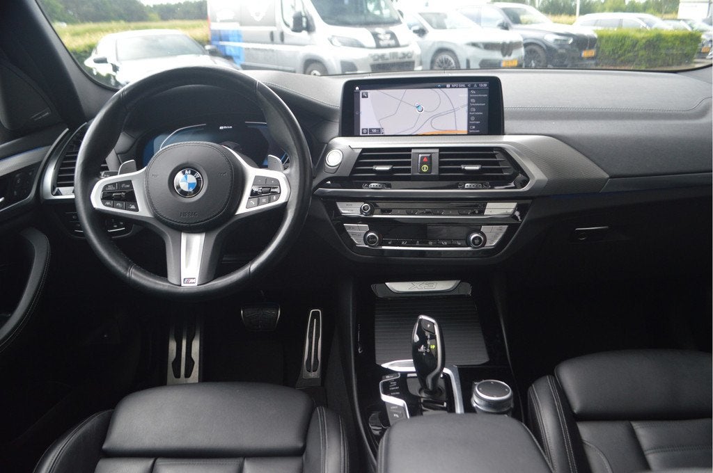 BMW X3 xDrive30e M Sport Automaat / Panoramadak / Sportstoel, Auto's, BMW, 1998 cc, Zwart, 4 cilinders, Zwart