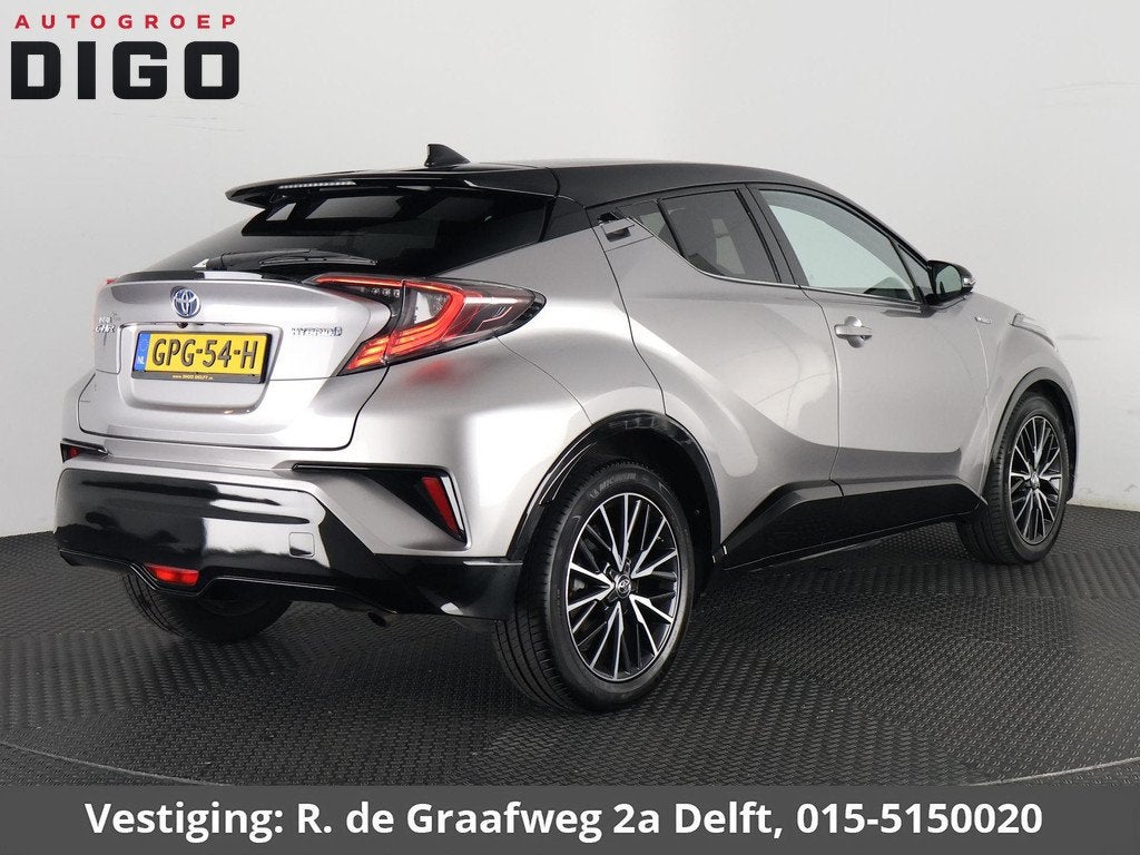 Toyota C-HR 1.8 Hybrid Executive Limited Bi-Tone | Navigatie, Stof, 4 cilinders, 122 pk, Bedrijf