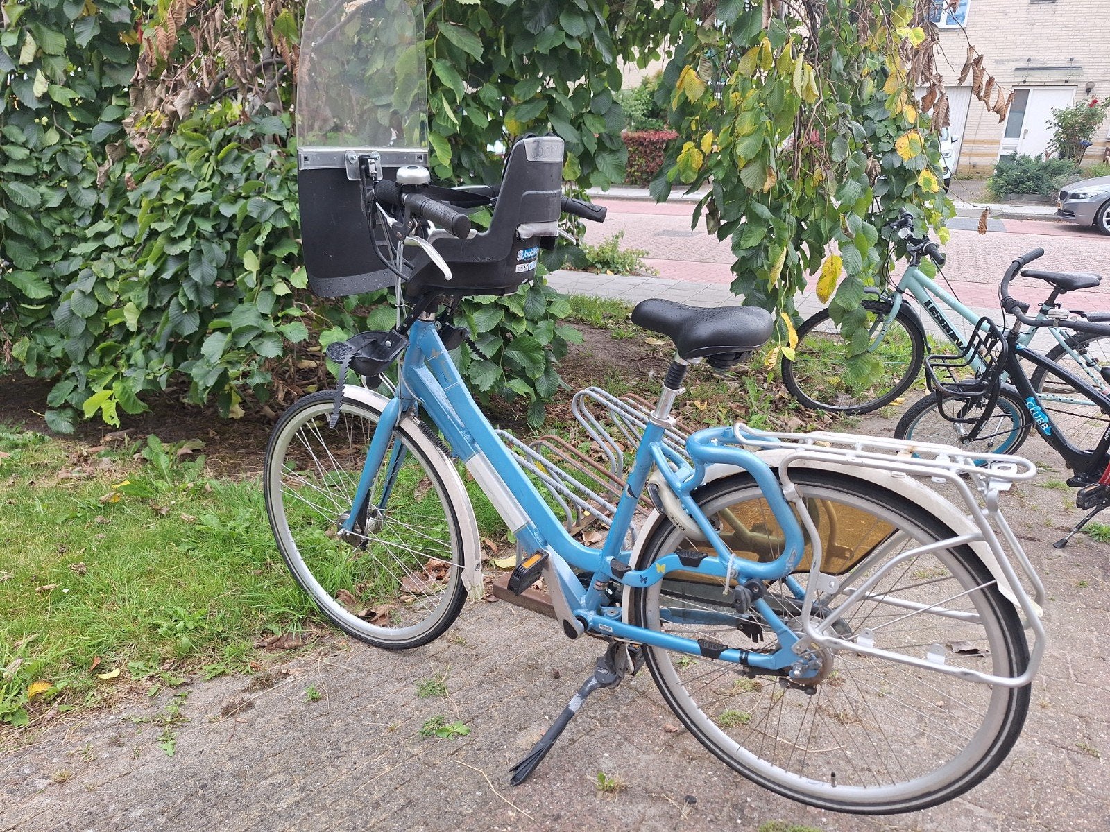 Opknapper: Blauwe fiets met kinderzitje en windscherm, Fietsen en Brommers, Velgrem, Versnellingen, Ophalen, Overige merken