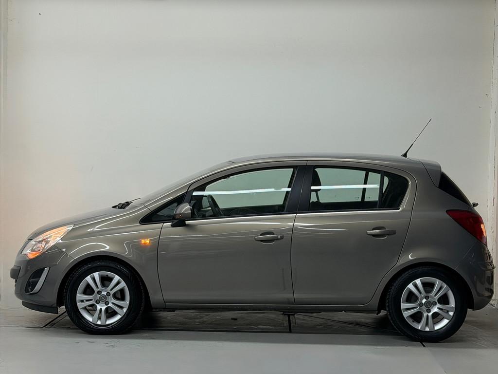 Opel Corsa 1.2-16V Edition Automaat Cruise Lage KM, Auto's, Euro 5, Gebruikt, 4 cilinders, Bruin
