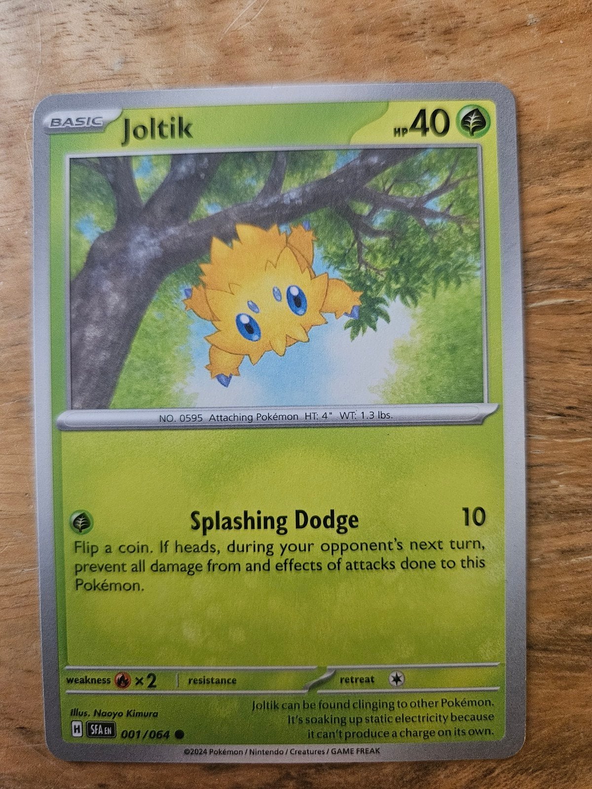 Joltik Pokémon Kaart - Basic, HP 40, Splashing Dodge, Ophalen of Verzenden, Zo goed als nieuw, Losse kaart