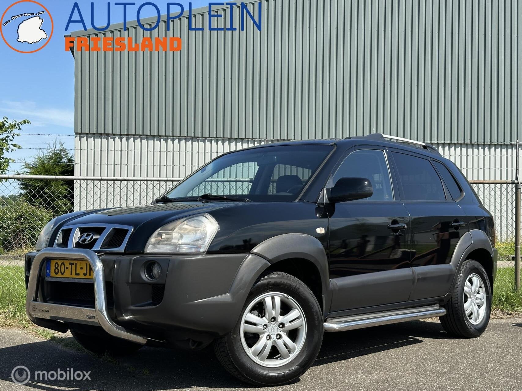 Hyundai Tucson 2.0i Style|Trekhaak|Leer|Clima|PDC|Cruise, Auto's, Gebruikt, 4 cilinders, Zwart, Handgeschakeld