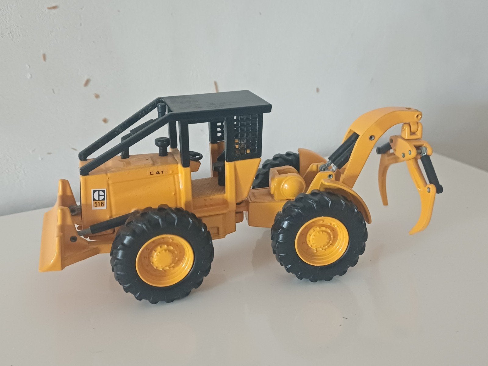 Skidder cat 1/50, Hobby en Vrije tijd, Modelauto's | 1:50, Ophalen of Verzenden, Zo goed als nieuw, Hijskraan, Tractor of Landbouw