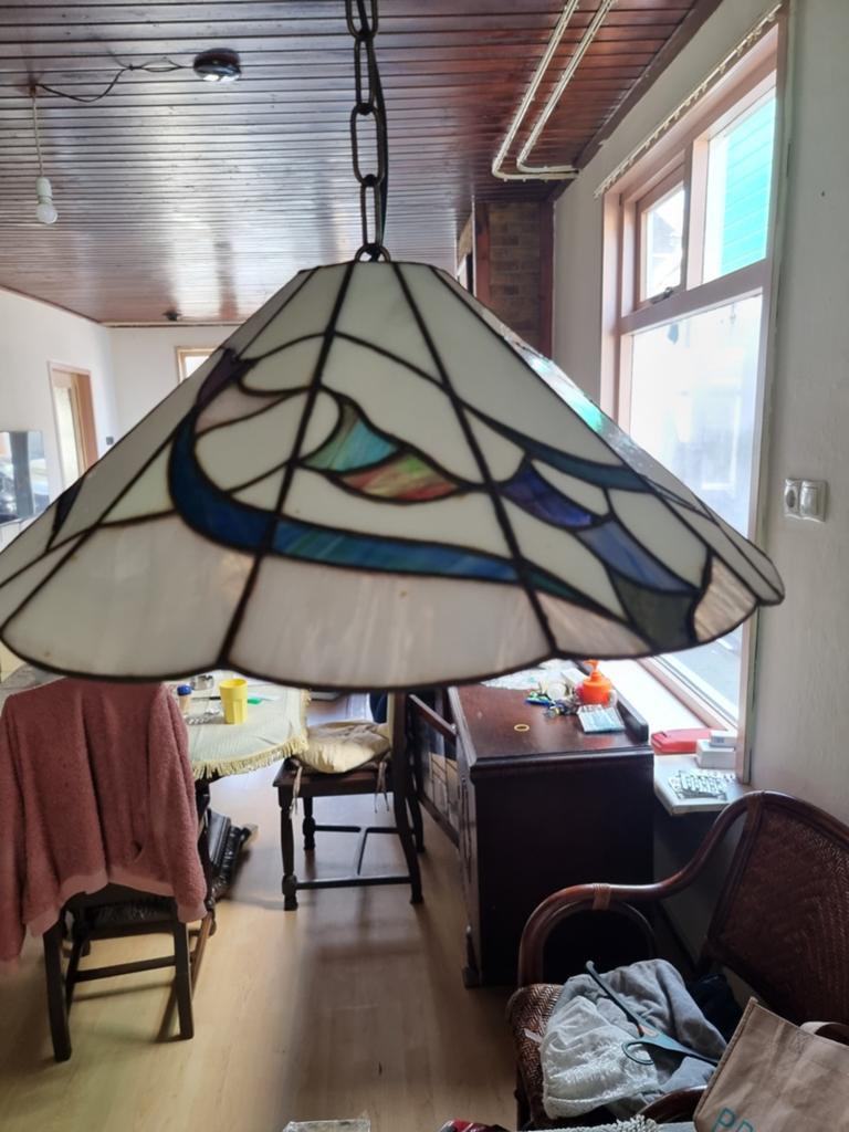 Titanium lamp 1e generatie, Ophalen