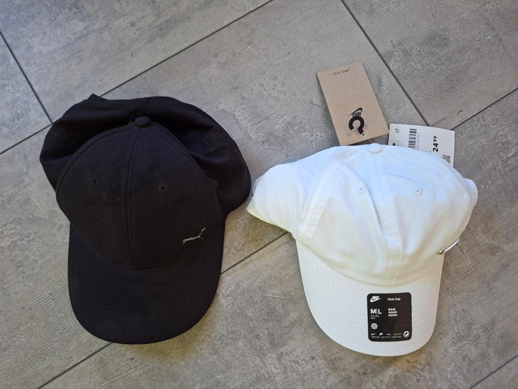 2 Nieuwe caps 1 zwart van Puma en wit van Nike, Kleding | Heren, Hoeden en Petten, Ophalen of Verzenden, Nieuw
