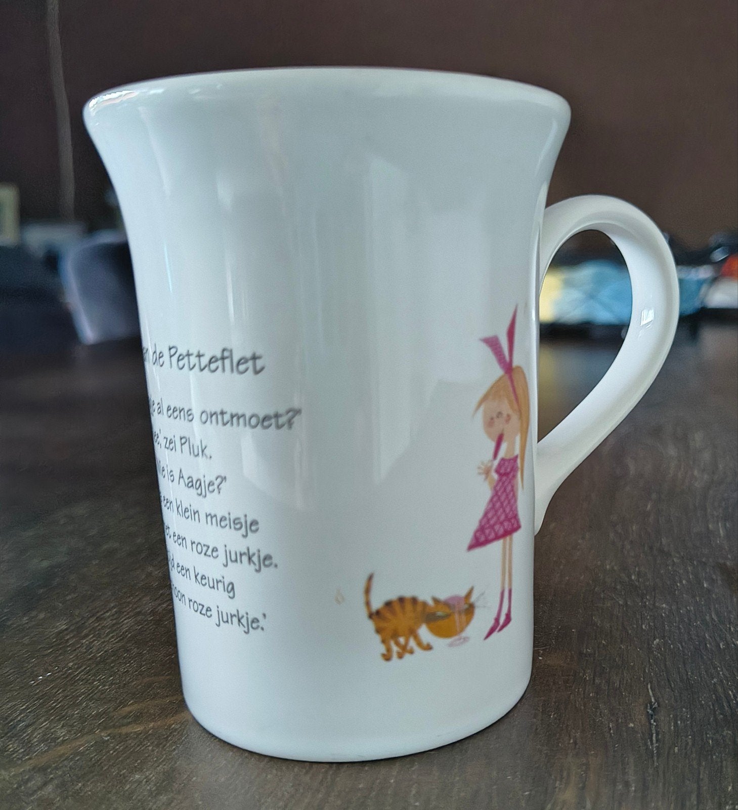 Mok met illustraties en tekst - Puk van de Petteflet, Huis en Inrichting, Overige typen, Ophalen of Verzenden, Zo goed als nieuw