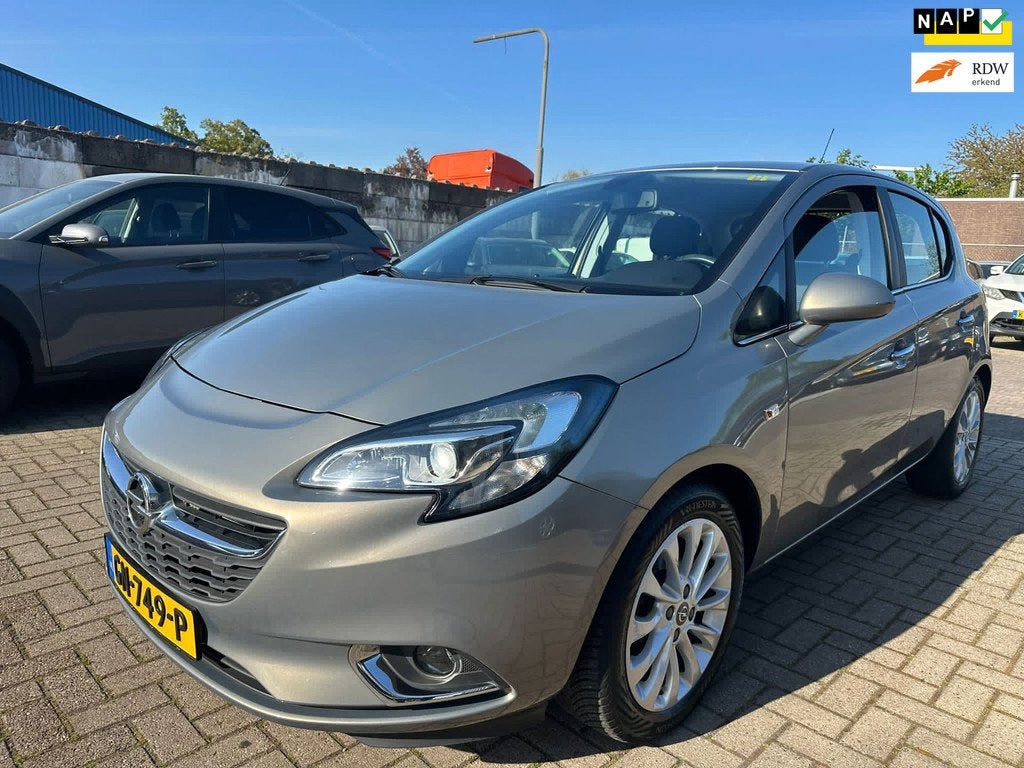 Opel Corsa 1.4 Cosmo AUTOMAAT/ CLIMA/ XENON/ CRUISE!, Auto's, 1063 kg, Gebruikt, 4 cilinders, Bruin
