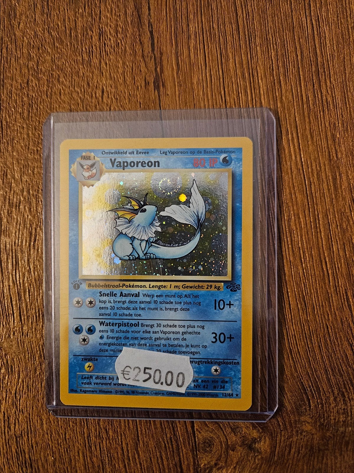 Vaporeon 1e editie Nederlandse Pokémon uitstekende staat, Hobby en Vrije tijd, Verzamelkaartspellen | Pokémon, Ophalen of Verzenden