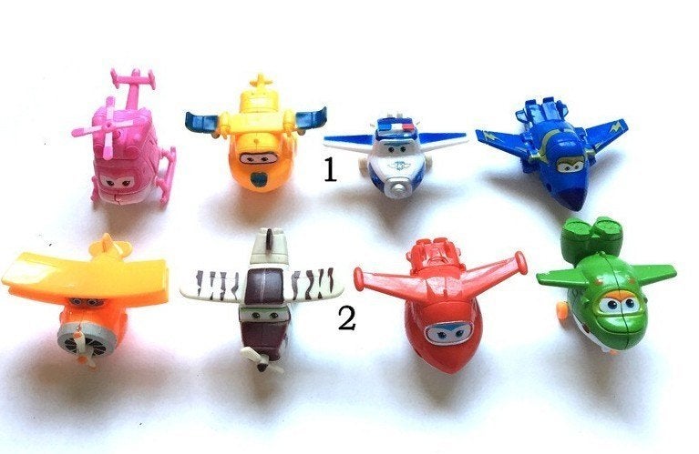 Div. SUPER WINGS houders/toppers, prikkers, figuurtjes enz., Ophalen of Verzenden, Nieuw, Taarten of Cupcakes, Versiering