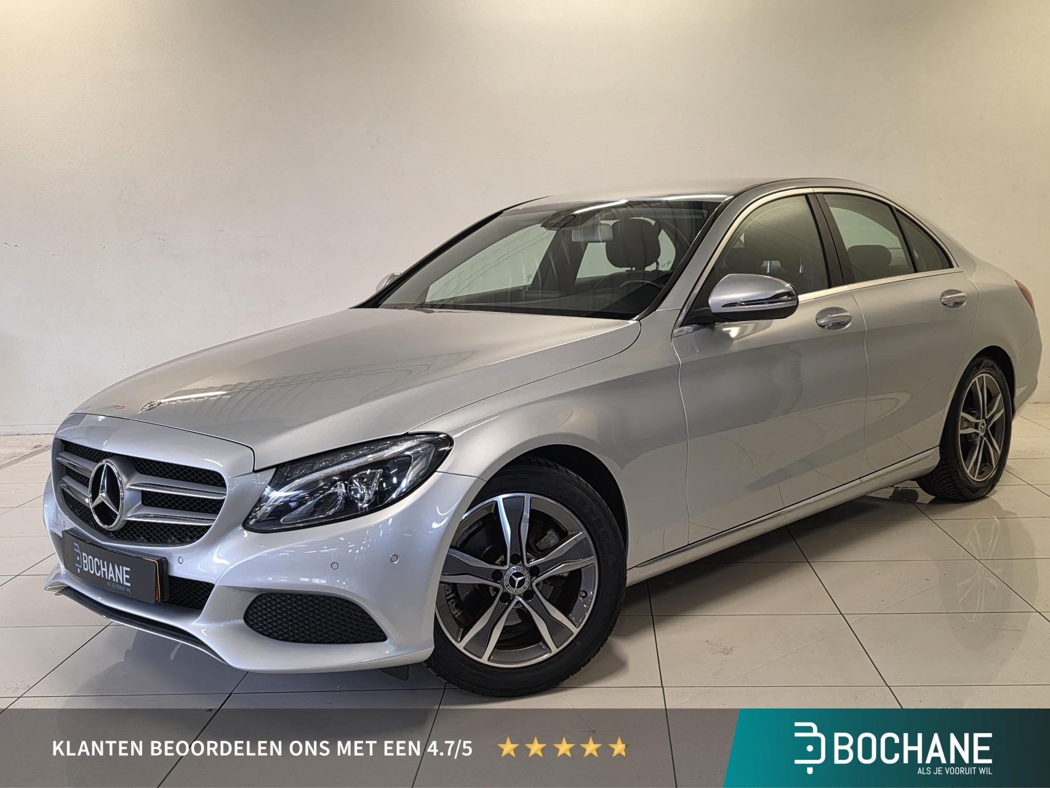 Mercedes-Benz C-klasse 180 Business | Navigatie | Stoelverwa, Achterwielaandrijving, Gebruikt, Met garantie (alle), Leder en Stof