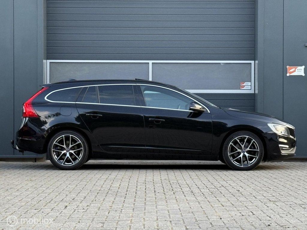 Volvo V60 2.0 D4 Geartronic Polestar Momentum Schuifdak Xeno, Auto's, 1502 kg, 1750 kg, 4 cilinders, Leder en Stof
