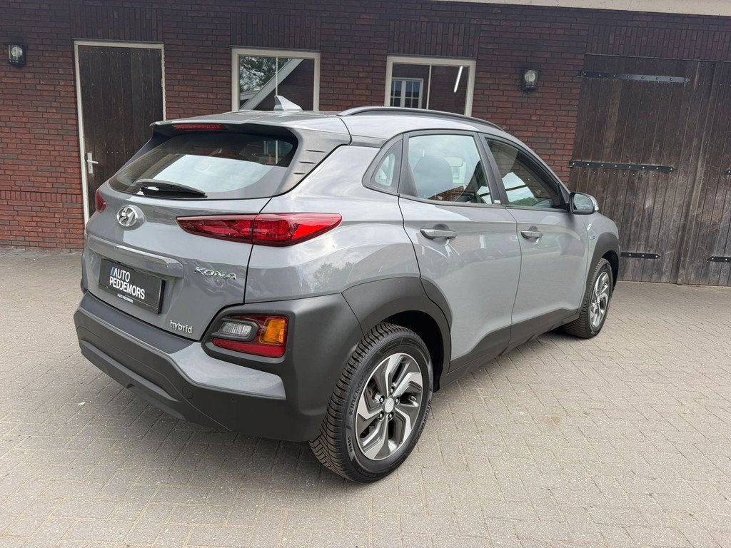 Hyundai Kona 1.6 GDI HEV Comfort | Carplay| Camera| Stoel en, Stof, Gebruikt, Zwart, Start-stop-systeem