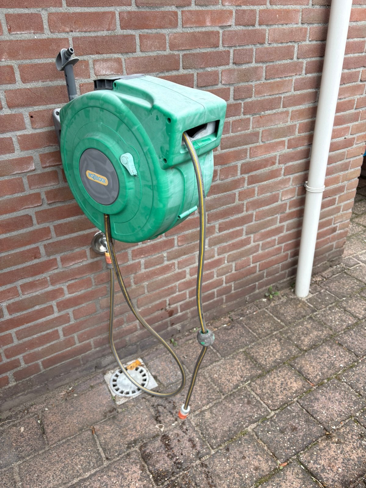 Hozelock muurhaspel , lengte slang 17 mtr, Tuin en Terras, Tuinslangen, Ophalen, Gebruikt, Tuinslang