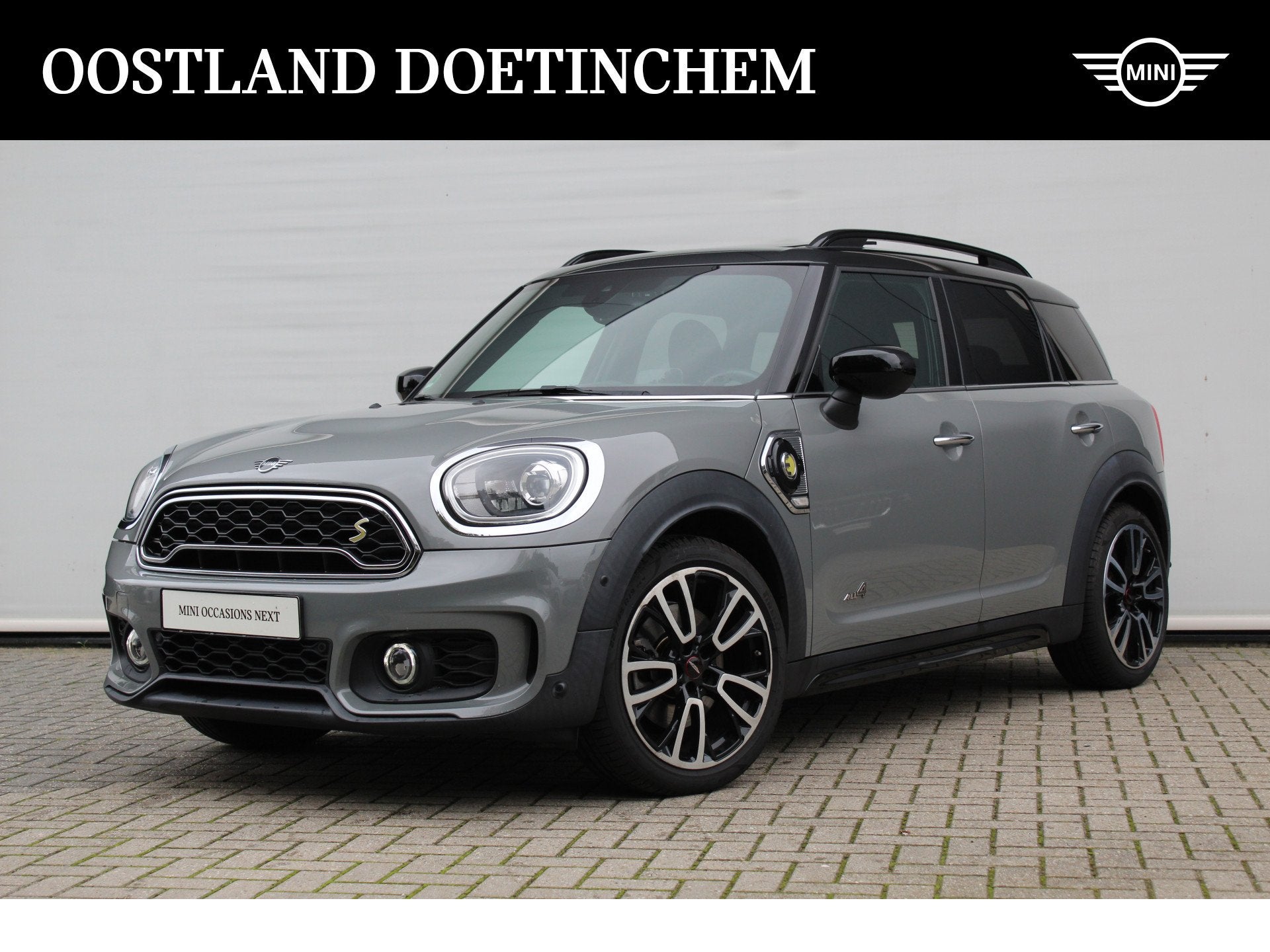 MINI Countryman Cooper S E ALL4 JCW Automaat / Panoramadak /, Auto's, Automaat, Dealer onderhouden, Gebruikt, Met garantie (alle)