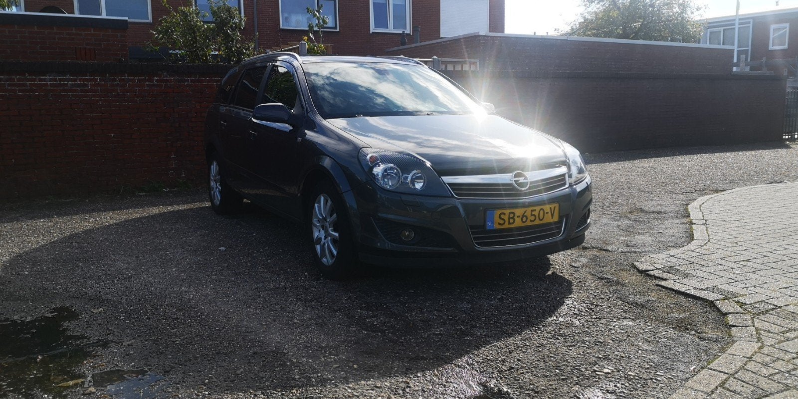 Opel Astra 1.6 St.wgn.NWE APK/LEER/Climate/CRUISE/PDC, Voorwielaandrijving, 15 km/l, Zwart, Leder en Stof