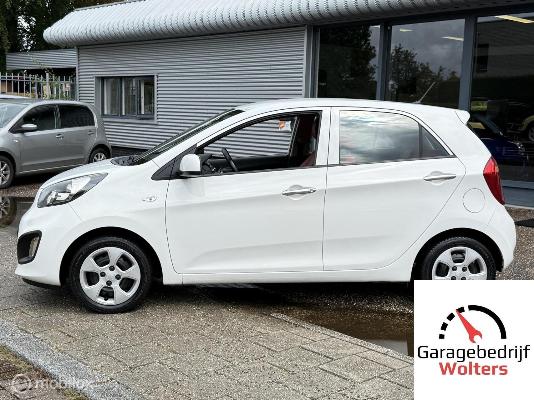 Kia Picanto 1.0 Design Edition rood leer stoel+stuurverw., Voorwielaandrijving, Gebruikt, Met garantie (alle), Wit