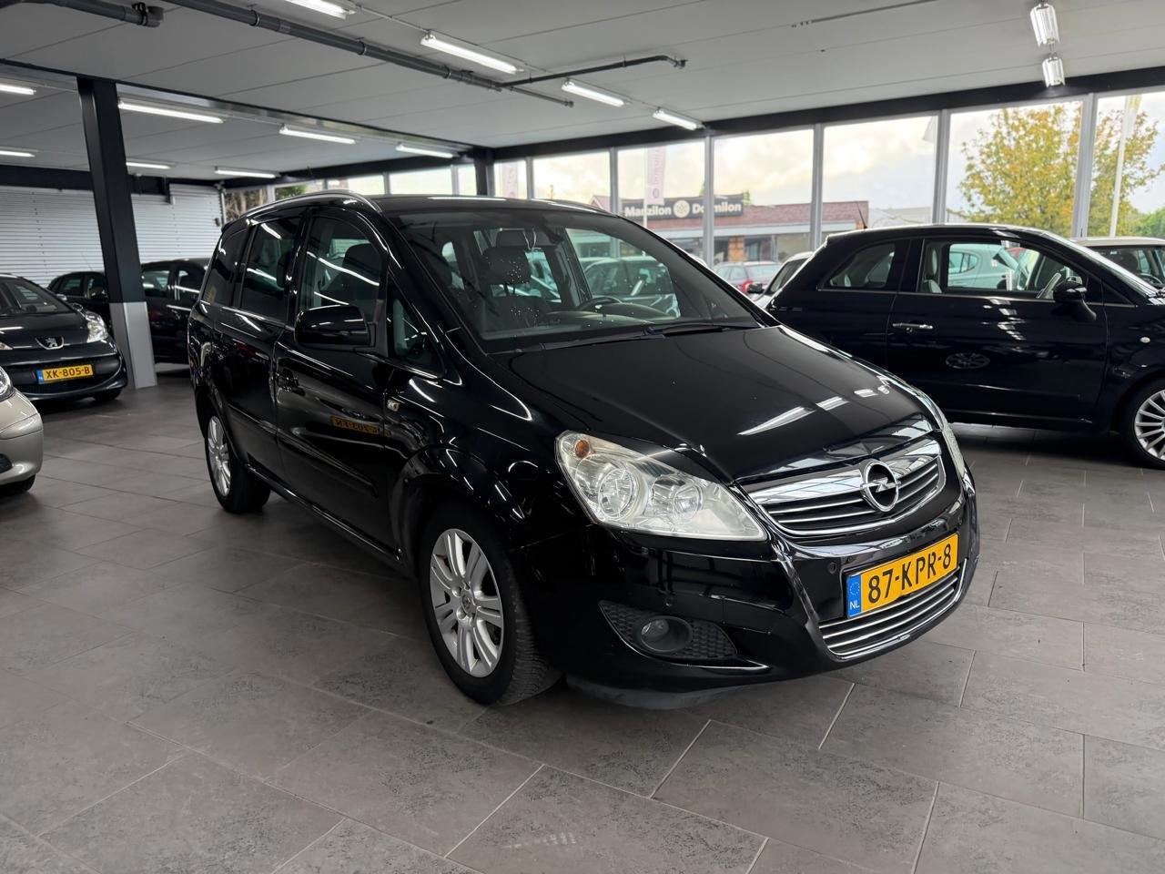 Opel Zafira 1.8 Cosmo automaat 7-prs half leer navigatie cli, Auto's, Gebruikt, Zwart, 4 cilinders, Zwart