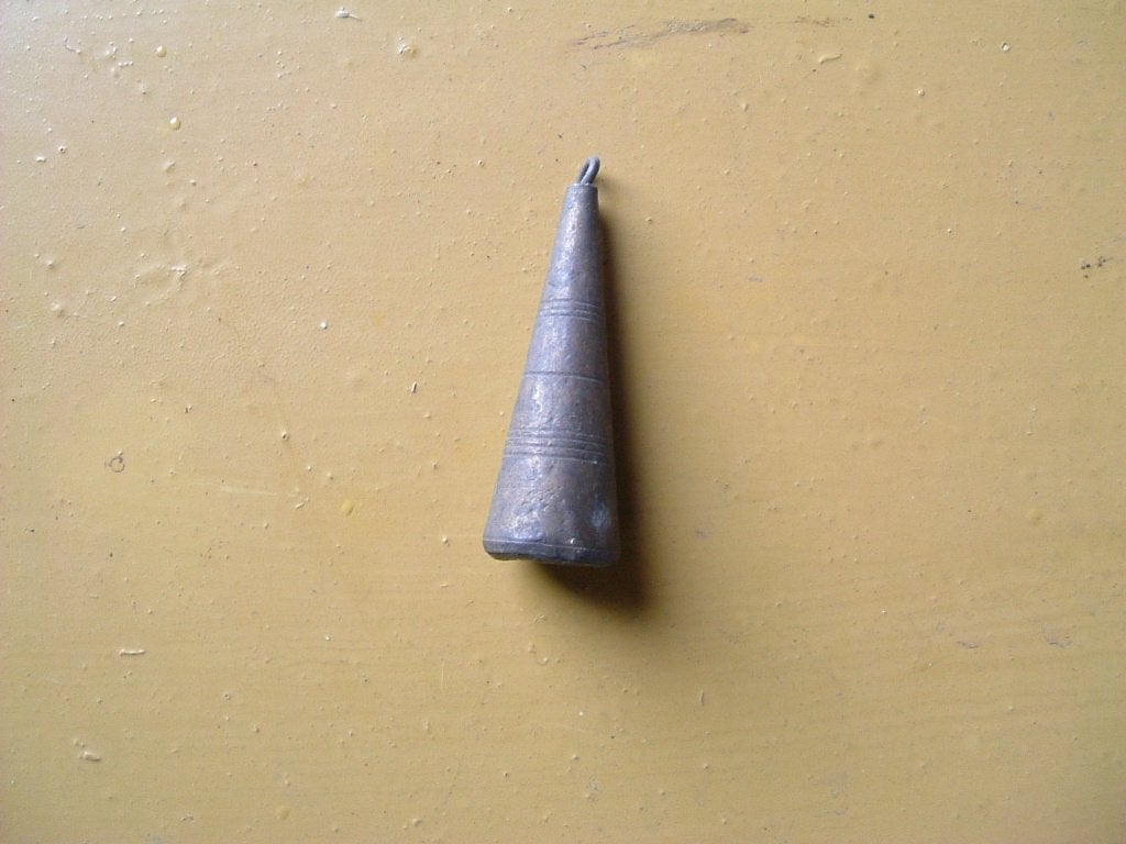 Een antiek schietlood van koper. Puntvormig., Antiek en Kunst, Ophalen of Verzenden