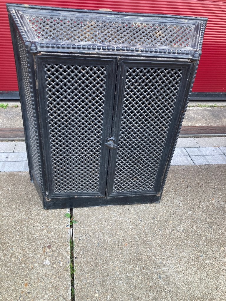 Antiek zwart geëmailleerde kachel, Ophalen