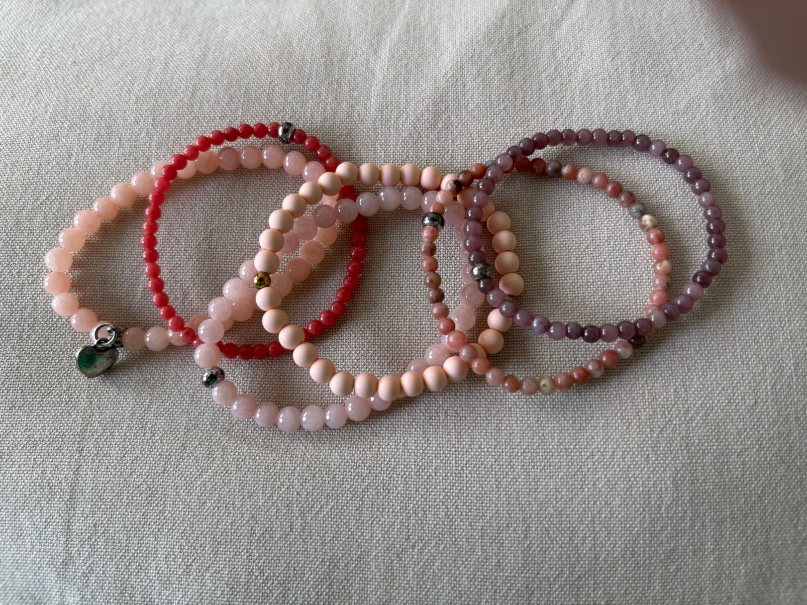 Armbandjes, Verzenden, Zo goed als nieuw, Roze, Elastiek