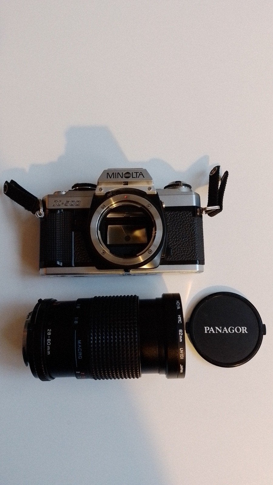 Minolta X500, Panagor-E PMC Auto Zoom 28-80mm lens, UVfilter, Ophalen of Verzenden, Gebruikt, Spiegelreflex, Minolta