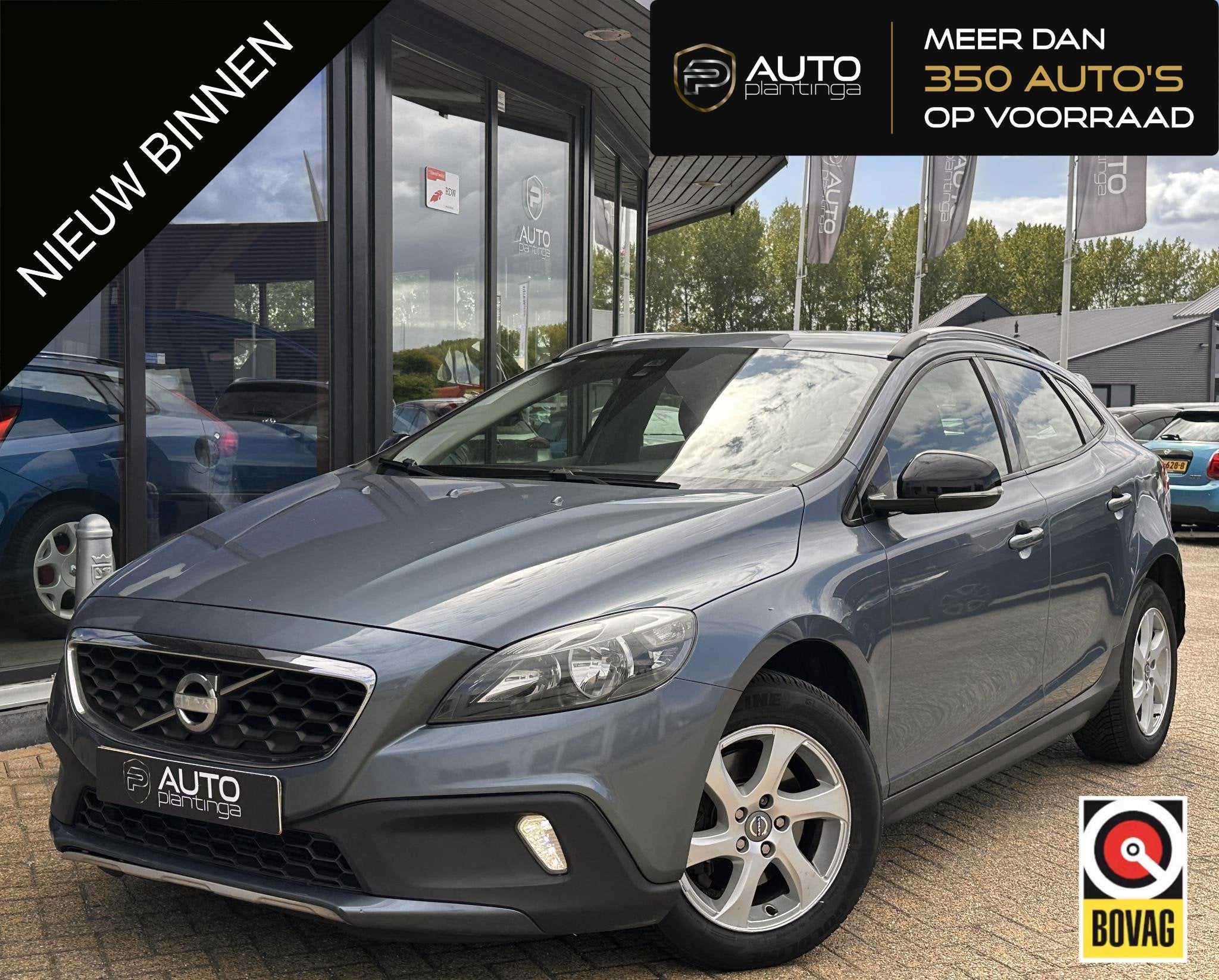 Volvo V40 Cross Country 1.6 T4 Momentum 179PK | NL AUTO | NA, Auto's, Volvo, Voorwielaandrijving, Gebruikt, 4 cilinders, Leder en Stof