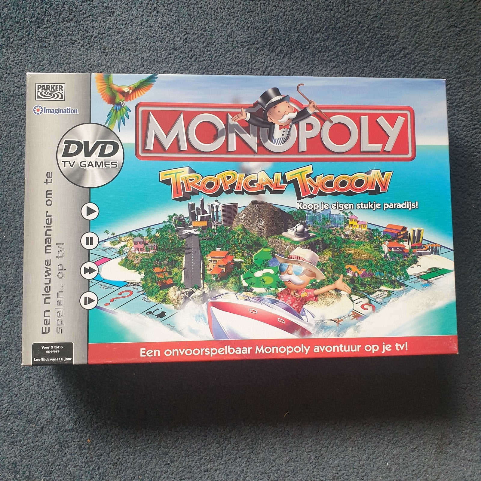 Monopoly Tropical Tycoon - Compleet bordspel met DVD, Hobby en Vrije tijd, Drie of vier spelers, Ophalen, Zo goed als nieuw, Parker / Hasbro