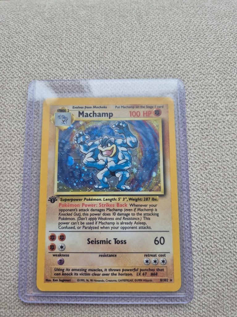 Pokémon Machamp 8/102 1st Edition Holo – Base Set (1999), Ophalen of Verzenden, Zo goed als nieuw, Losse kaart