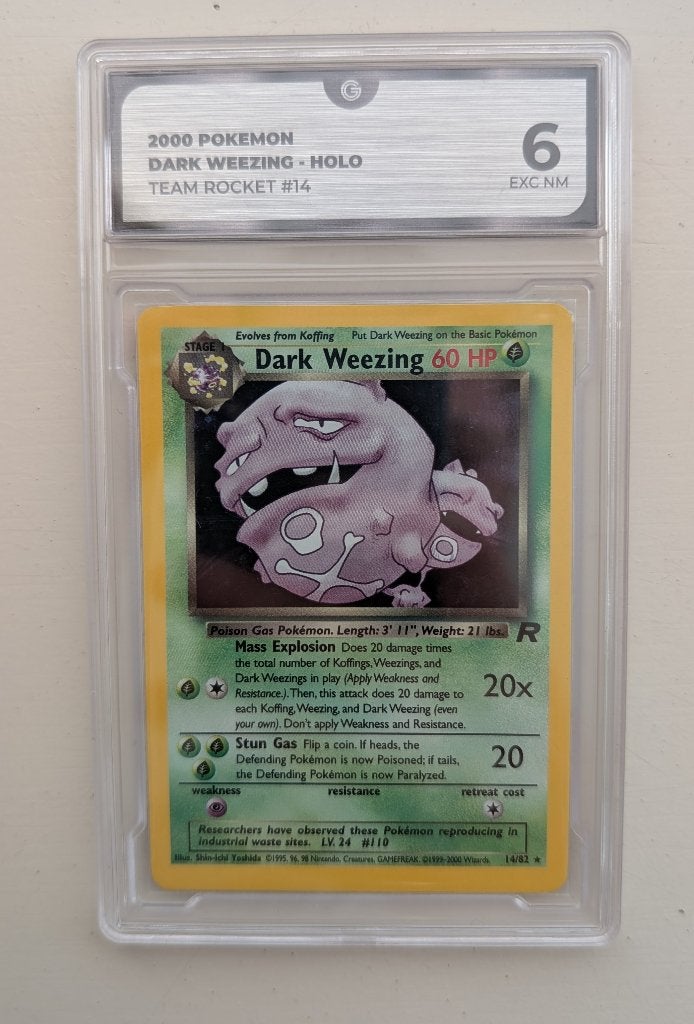 Pokémon kaart Dark Weezing Holo 14/82 - Team Rocket: Grade 6, Ophalen of Verzenden, Zo goed als nieuw, Losse kaart, Foil