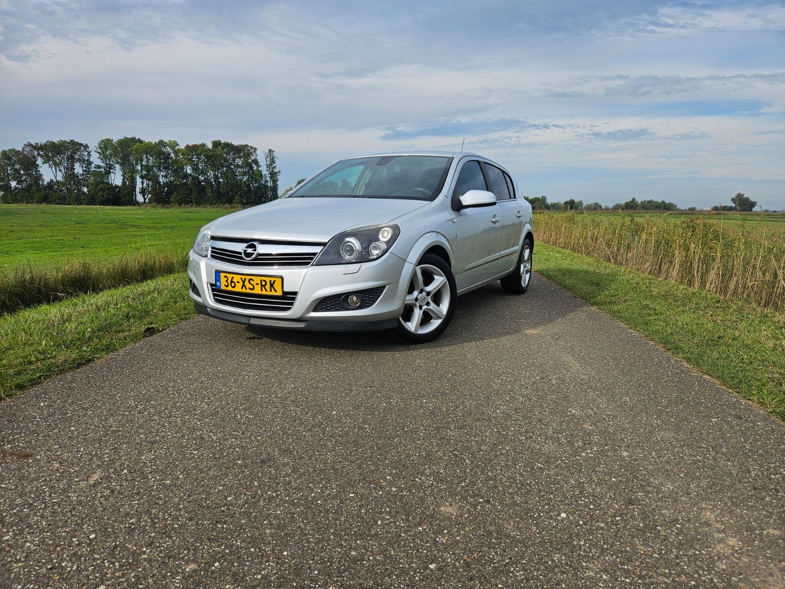 Opel Astra 1.6 16V Turbo 180pk, Auto's, Zwart, 4 cilinders, 179 pk, Leder en Stof