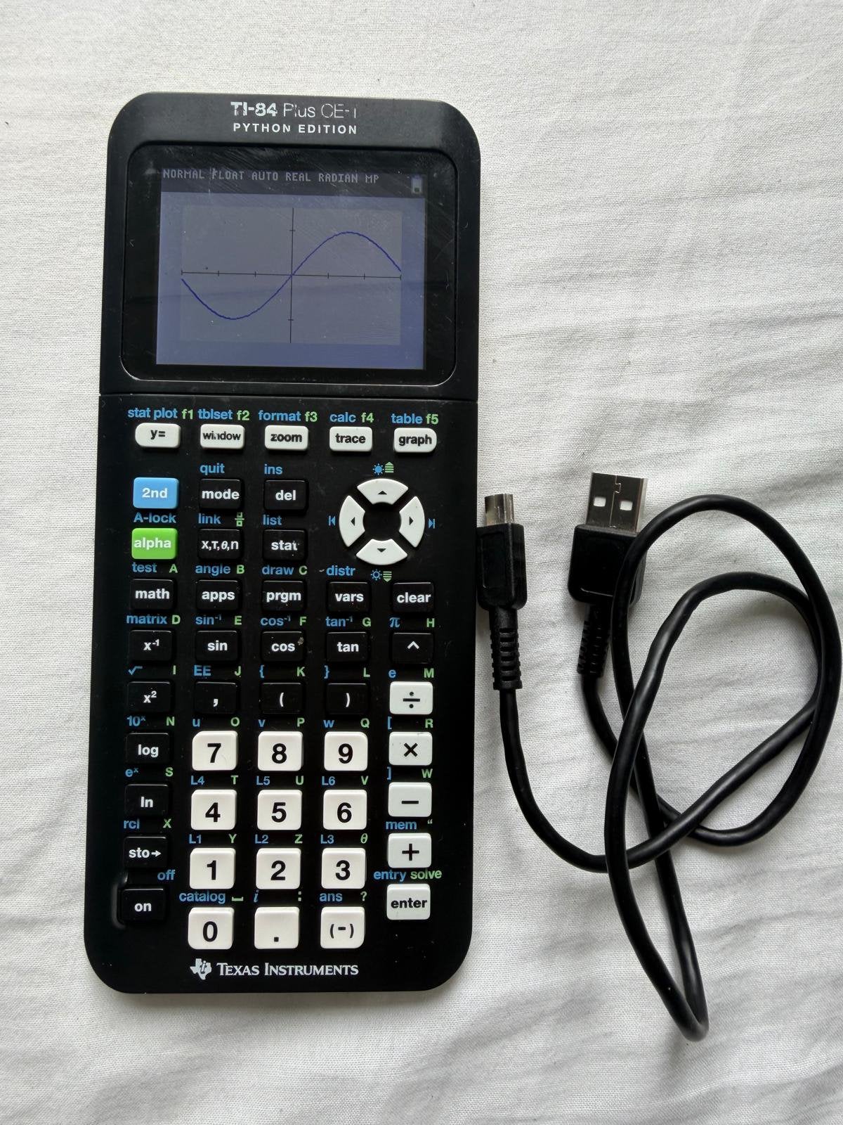 TI-84 Plus CE-T Grafische Rekenmachine incl. oplader, Diversen, Rekenmachines, Ophalen of Verzenden, Grafische rekenmachine, Zo goed als nieuw