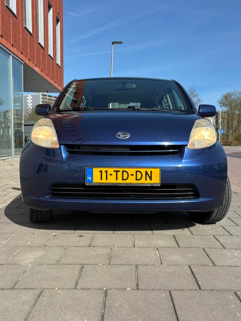 Daihatsu Sirion 2 1.0 51KW 2006 Blauw, Voorwielaandrijving, Stof, Blauw, Handgeschakeld
