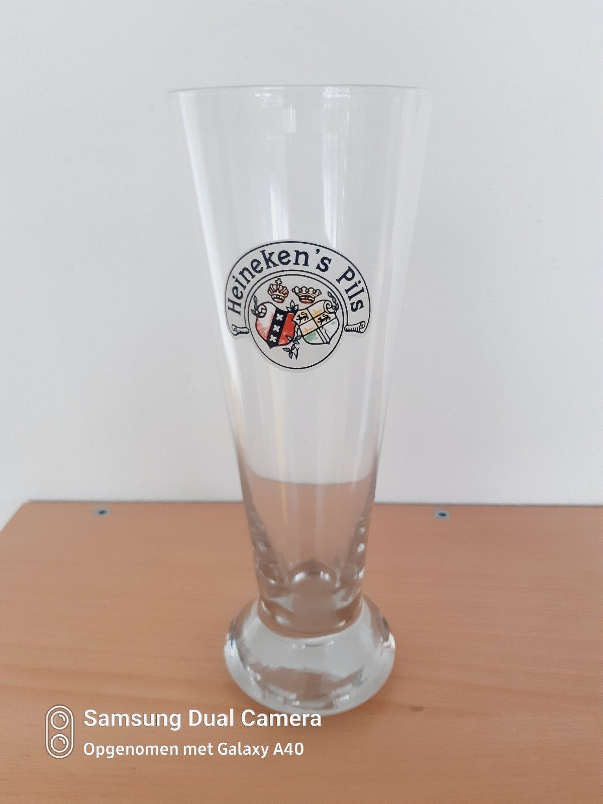 Mooie Heineken.s pils glas 21 cm, Ophalen of Verzenden, Zo goed als nieuw, Glas of Glazen, Heineken