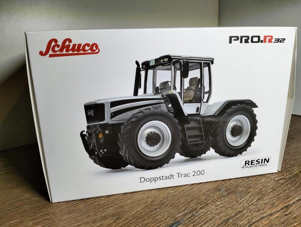 Te koop Schuco Doppstadt Trac 200 Zilver Gelimiteerd., Ophalen of Verzenden, Zo goed als nieuw, Tractor of Landbouw, Schuco