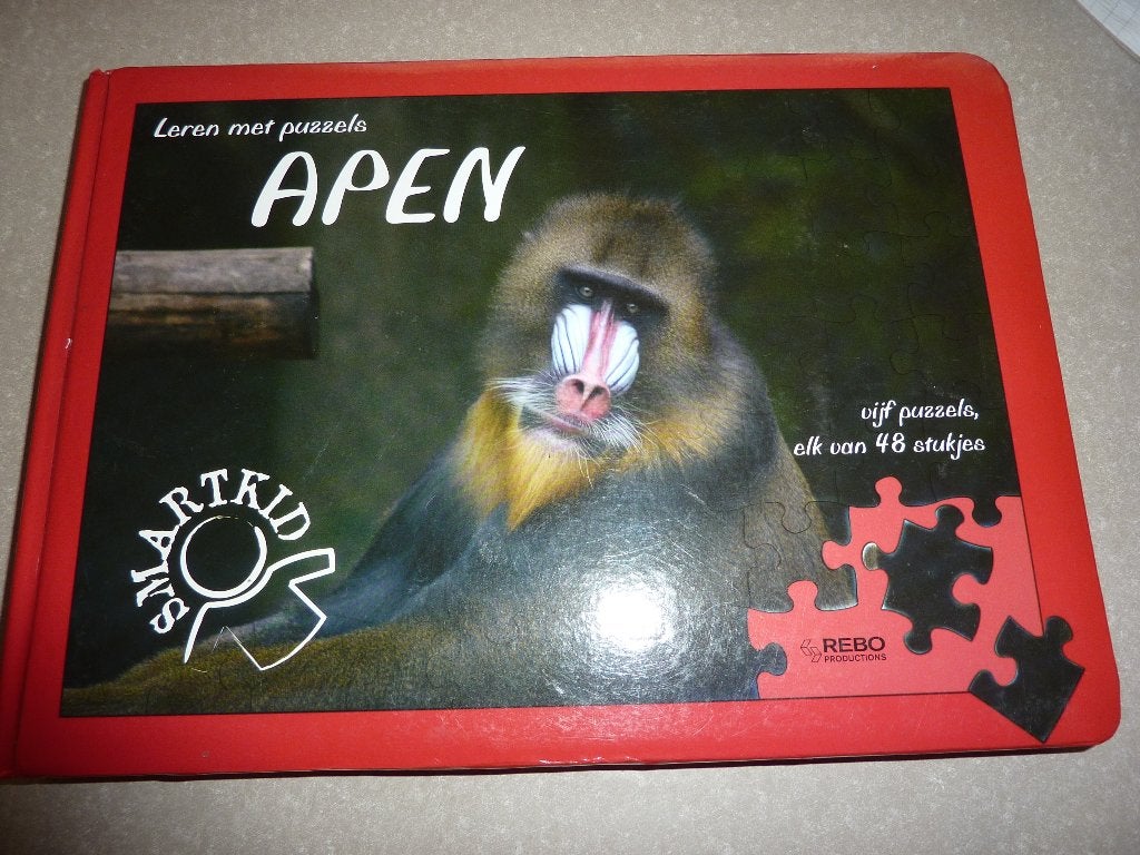 5 apen puzzels in boek, Ophalen of Verzenden, 10 tot 50 stukjes, Zo goed als nieuw