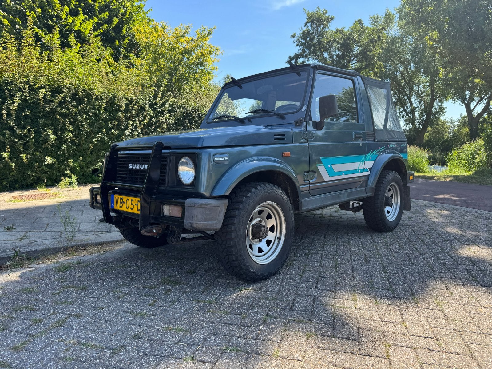 Suzuki Samurai Comm DE Luxe 4WD 1988, Auto's, Suzuki, 64 pk, 4 cilinders, Cabriolet, Blauw