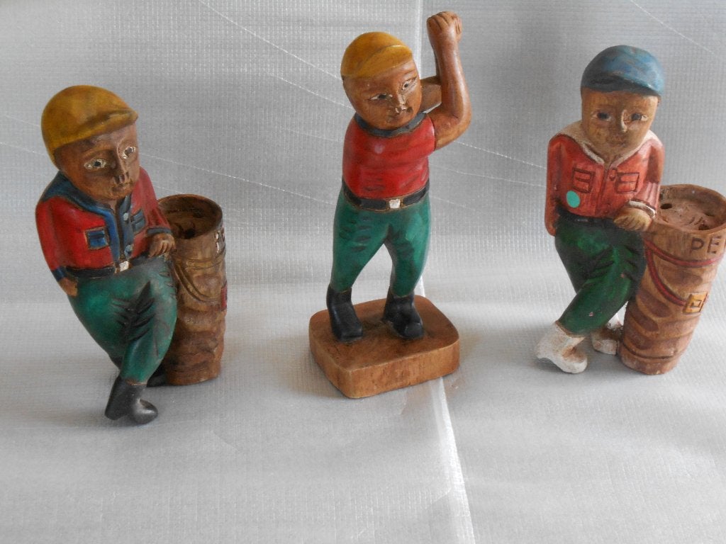 Set van drie houten beelden golf / golfers, Ophalen