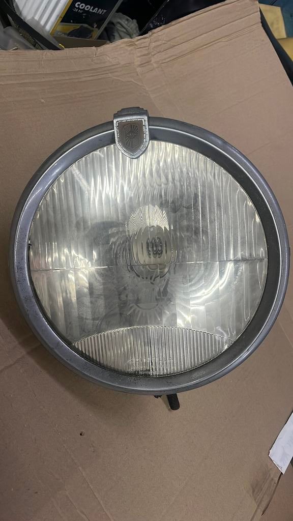 Oldtimer koplamp Scintilla, Ophalen