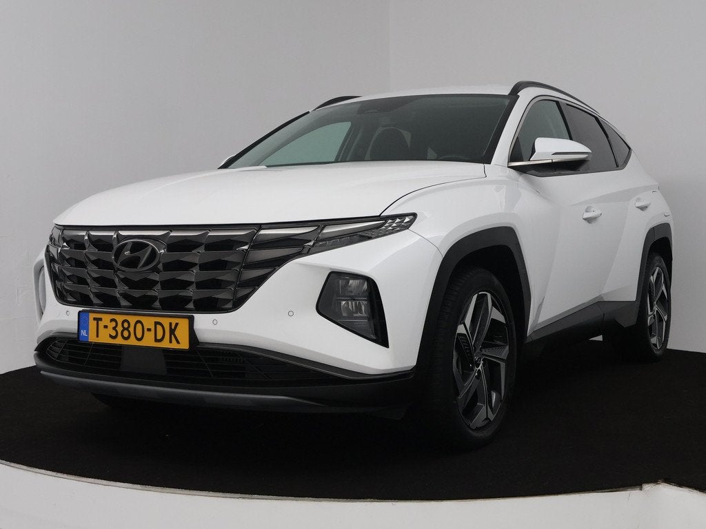 Hyundai Tucson 1.6 T-GDI PHEV Comfort Smart 4WD | Apple Carp, Auto's, Hyundai, Automaat, Stof, Gebruikt, Wit