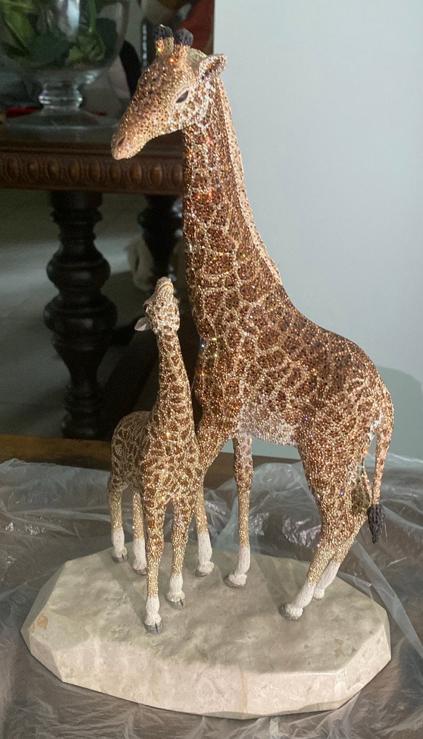 Swavoski Giraffe., Ophalen