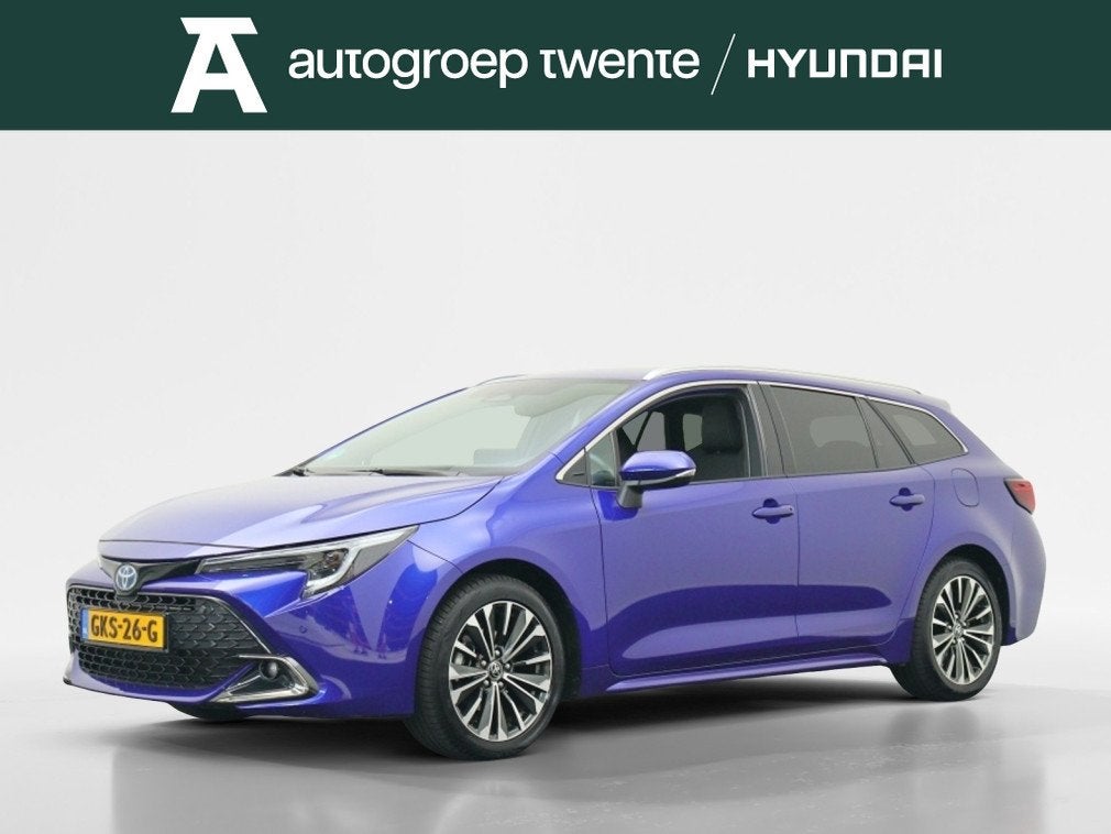 Toyota Corolla Touring Sports Hybrid 140 Business Plus | Tre, Auto's, Automaat, Gebruikt, 4 cilinders, Blauw