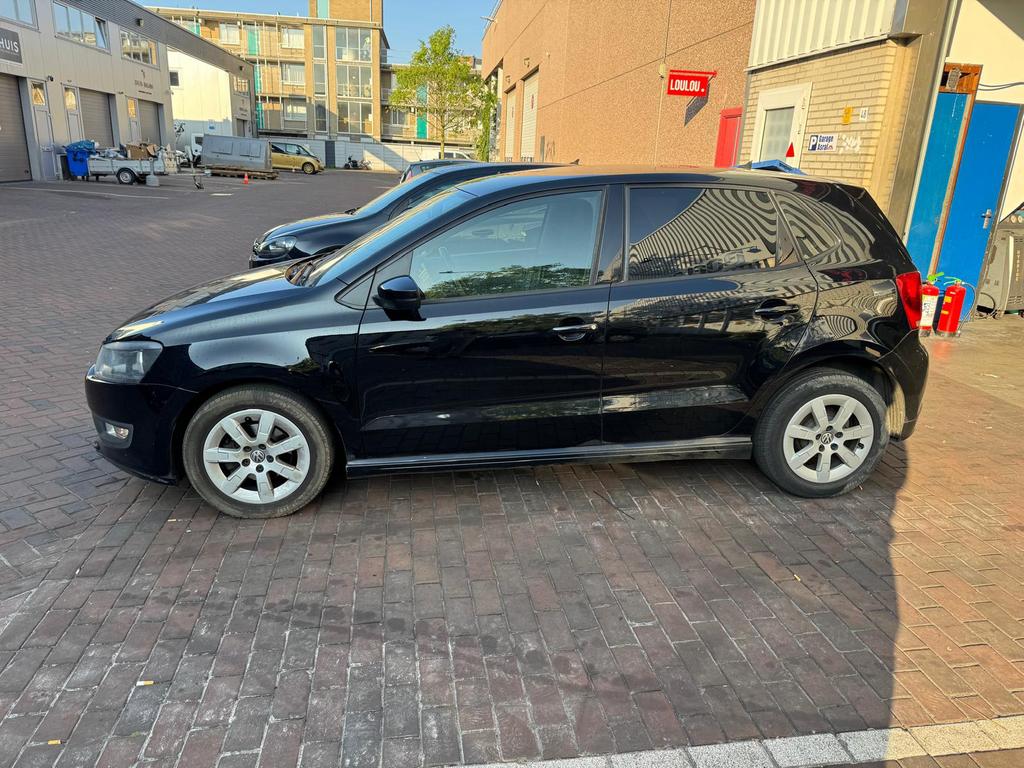 Volkswagen Polo 1.2 TDI 55KW BM 2013 Zwart, Auto's, Volkswagen, Voorwielaandrijving, Euro 5, Stof, 74 pk