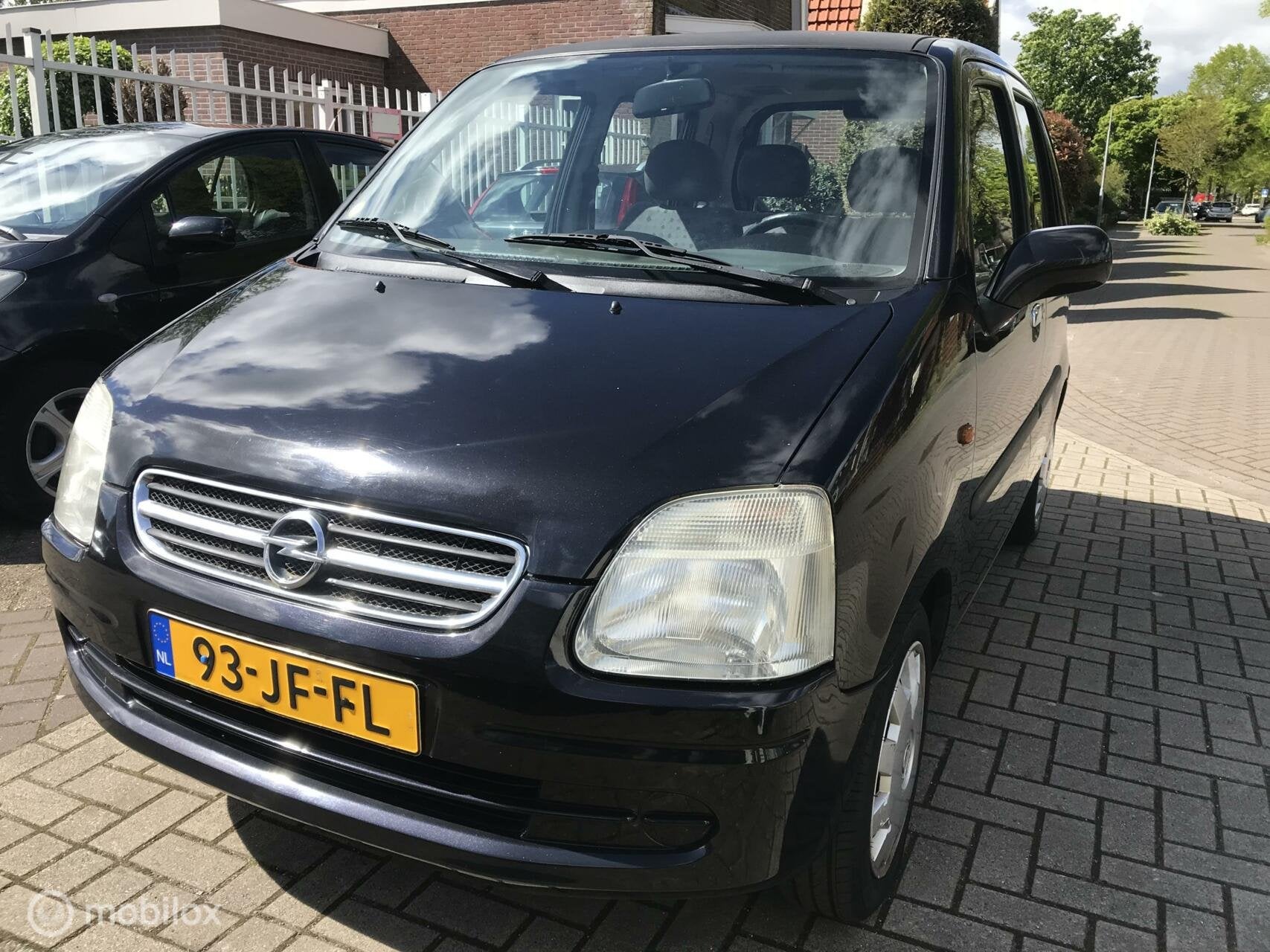 Opel Agila 1.2-16V Comfort, Auto's, Voorwielaandrijving, Gebruikt, 31 €/maand, Zwart