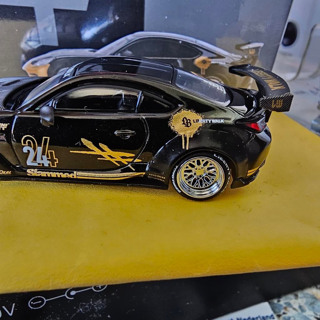 Mini GT Toyota GR86 LBNation Zwart/Goud Modelauto, Niet gespecificeerd, algemeen modelautomerk, Nieuw, Ophalen of Verzenden, Niet gespecificeerd