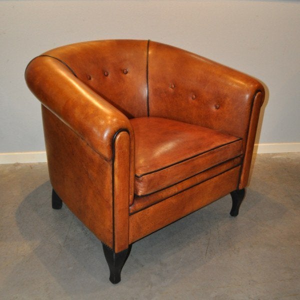 Schapenleren fauteuil met mooie gebogen poten., Gebruikt, Ophalen of Verzenden, 50 tot 75 cm, Leer