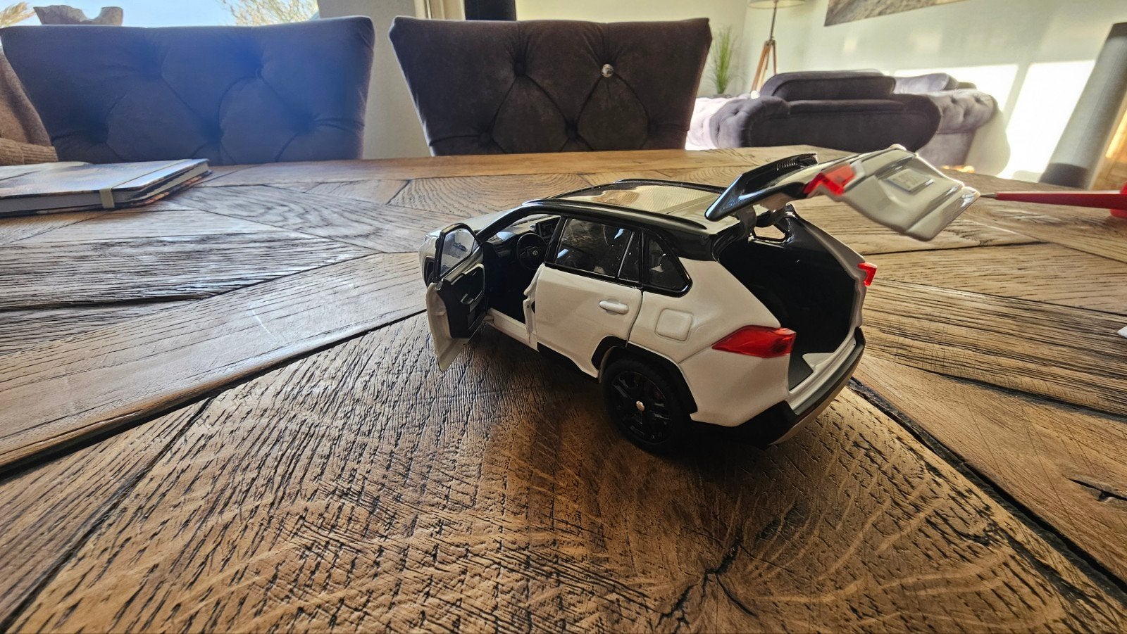 Toyota rav4 modelauto 1.32 Hybrid kleur bitone wit, Ophalen of Verzenden, Nieuw, Auto, Overige merken