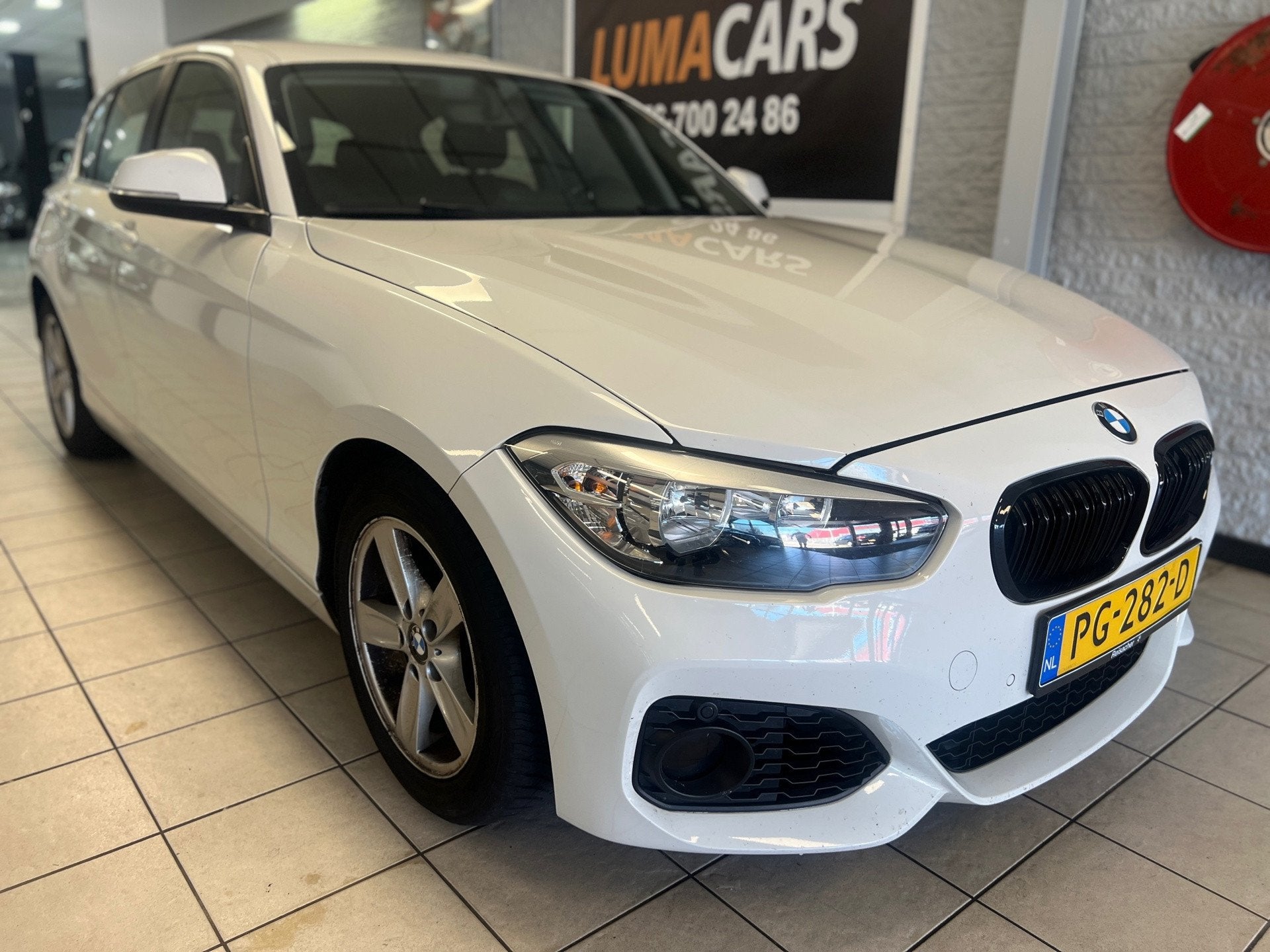 BMW 1-serie 116i Business | Nieuwe APK | Cruise | Automaat |, Euro 5, Gebruikt, 4 cilinders, 650 kg