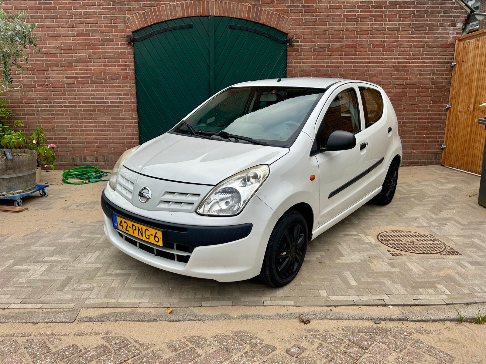 Nissan Pixo 1.0 Visia - 2011, Auto's, Voorwielaandrijving, Euro 5, Stof, 4 stoelen