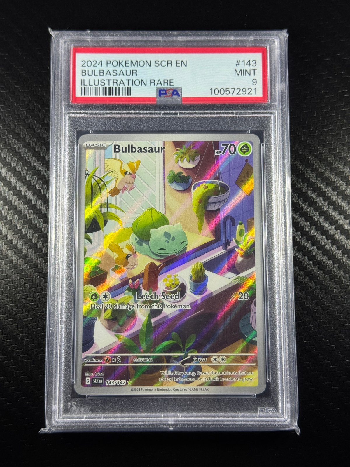 Bulbasaur | PSA 9 | Grass | Holo | IR | 2024 | #143/142, Ophalen of Verzenden, Zo goed als nieuw